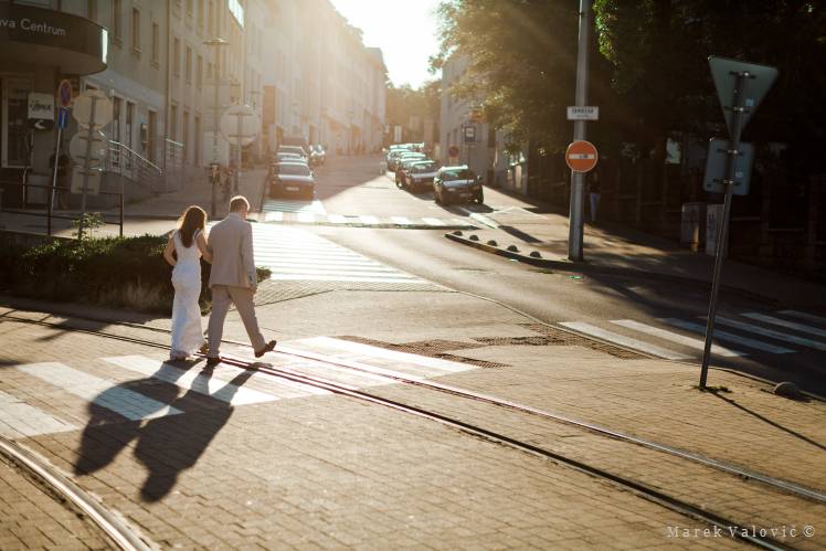 bride and groom in the city streets - natural wedding photography