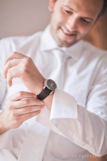 groom wearing the wrist watch