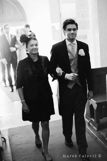 groom entering church with mother