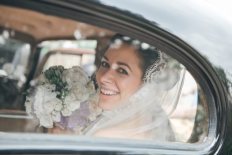 bride in vintage car